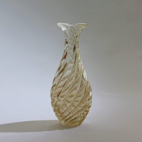 Flavio Poli, vase "Incrociato Oro", manufactured by Seguso Vetri d'Arte, Murano, Italy c. 1958. Colorless overlay glass, spirally ribbed body with fused, vertically ribbed gold foil.