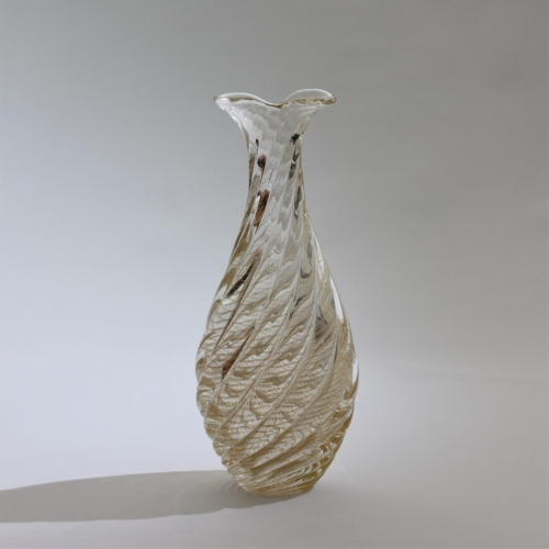 <em><b>Flavio Poli</b><br />Vase "Incrociato Oro"<br />Italy 1958</em> Flavio Poli, vase "Incrociato Oro", manufactured by Seguso Vetri d'Arte, Murano, Italy c. 1958. Colorless overlay glass, spirally ribbed body with fused, vertically ribbed gold foil.